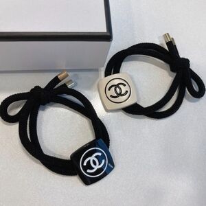 CHANEL Black and White Logo Hair Accessories
